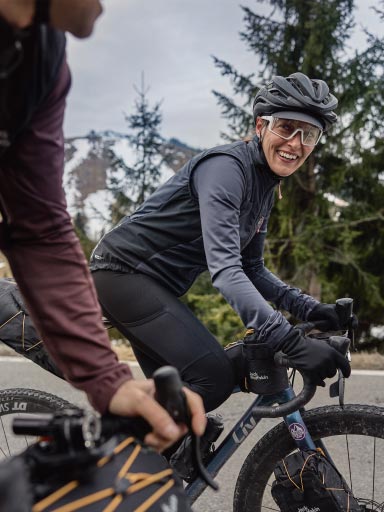 Man on a bike wearing a blue fleece jacket